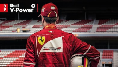 Vetell Piloto de Ferrari F1 de Espaldas